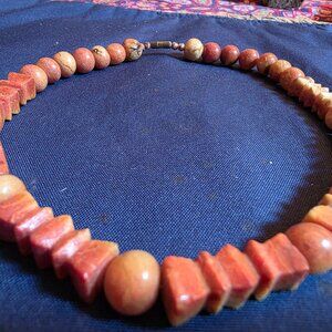SET OF ISLAND CORAL BEADS INCLUDING NECKLACE, BRACELET AND STUD EARRINGSG